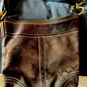 Classic brown coach crooks bag used body leatner still rich